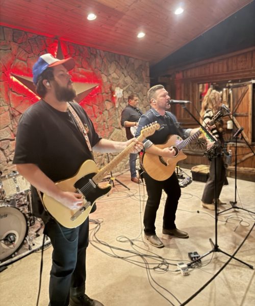 ben alston band playing music on the stage at san tan flat